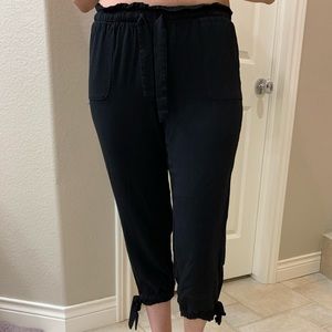 Lulus cropped black pants with ankle ties and waist tie.